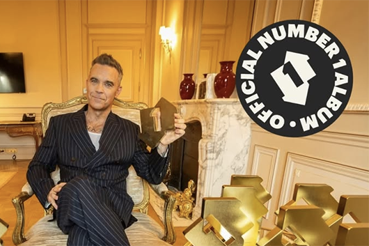 ロビー・ウィリアムズ、全英アルバム・チャート1位の数で遂にザ・ビートルズの記録を破る